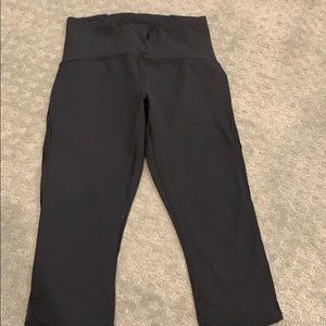 Lululemon black crop leggings with mesh stripe